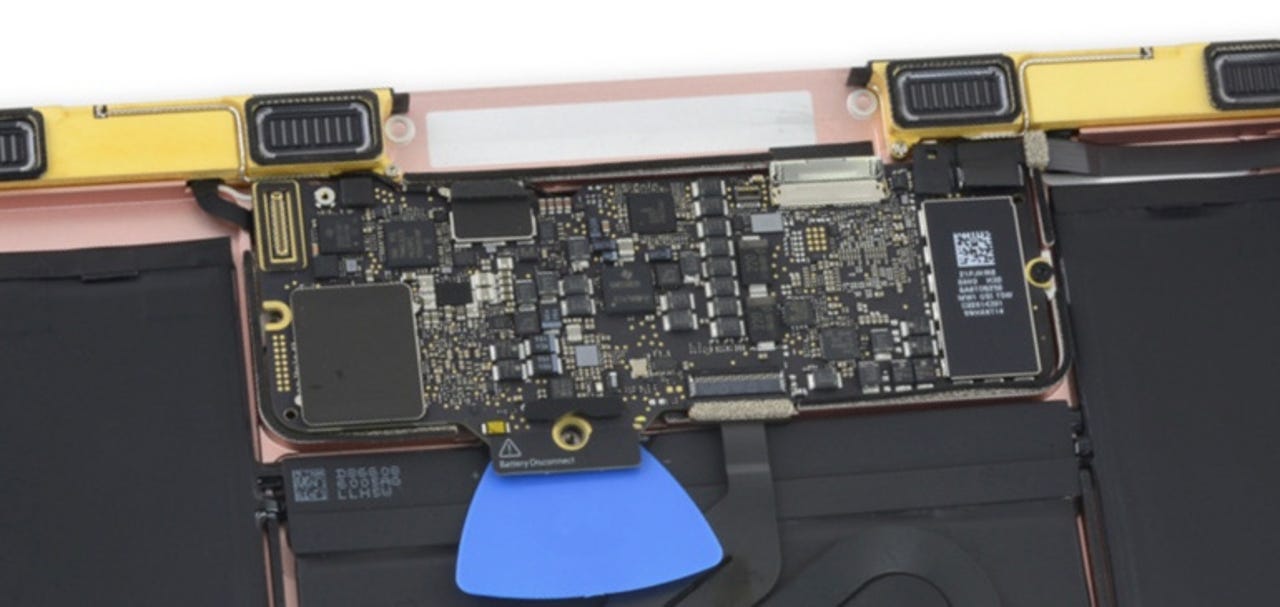 ​Apple MacBook logic board featuring 4 gigabytes of RAM