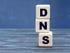 concept word DNS on cubes on a beautiful gray blue background