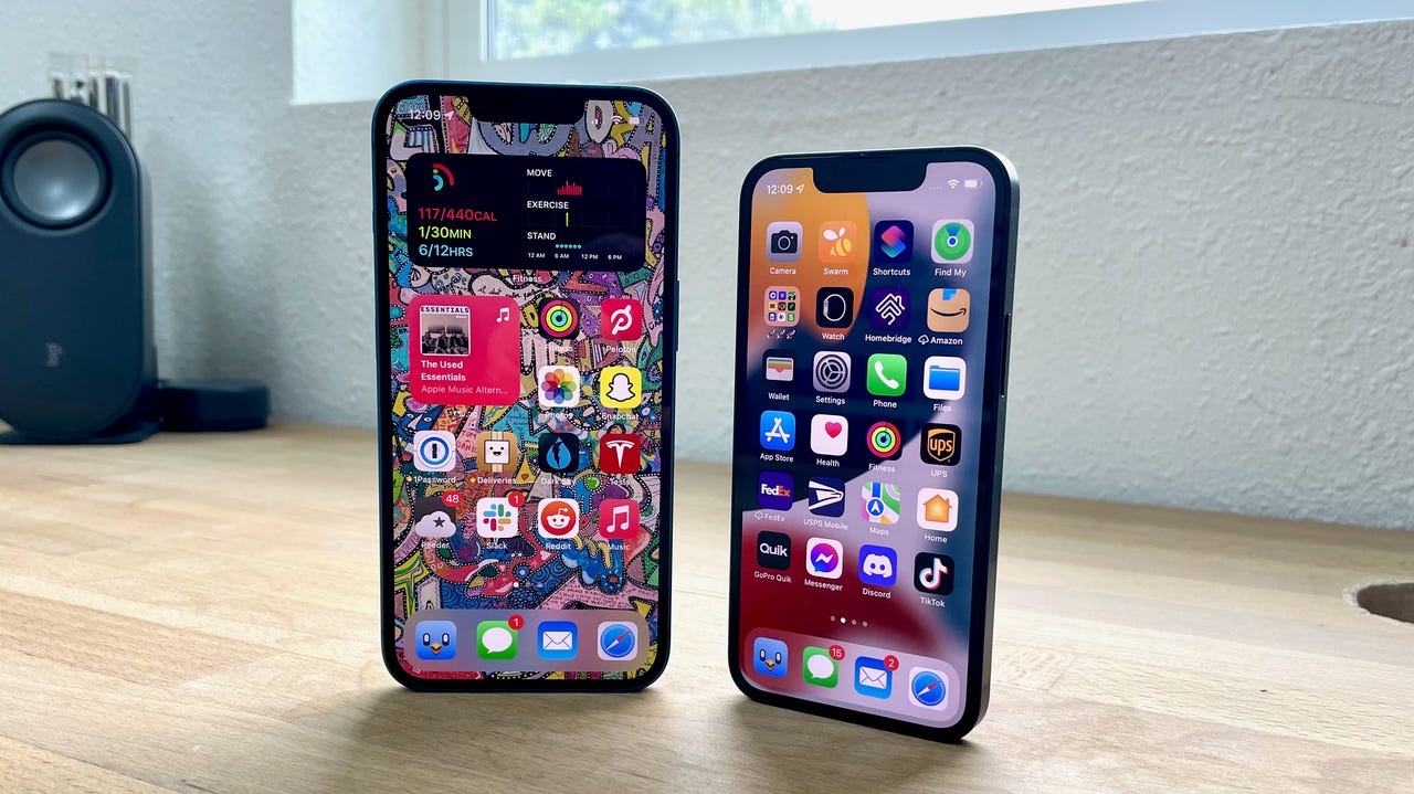 iPhone 13 and iPhone 13 Mini standing side by side