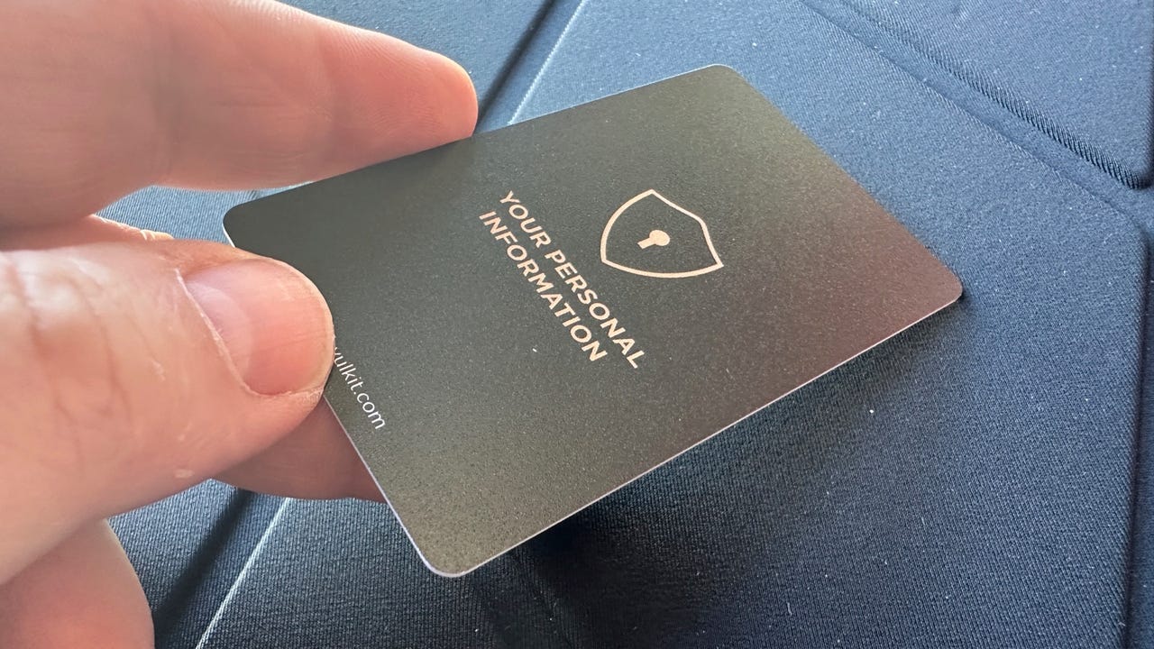 A black card with a logo of a lock in a shield and the words Your Personal Information