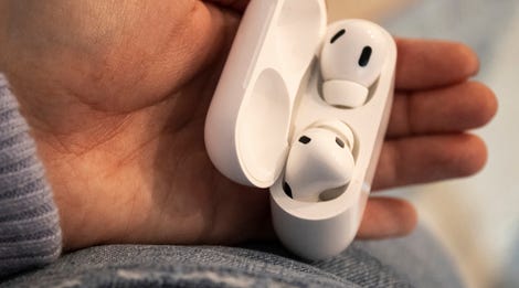 A pair of white Airpods