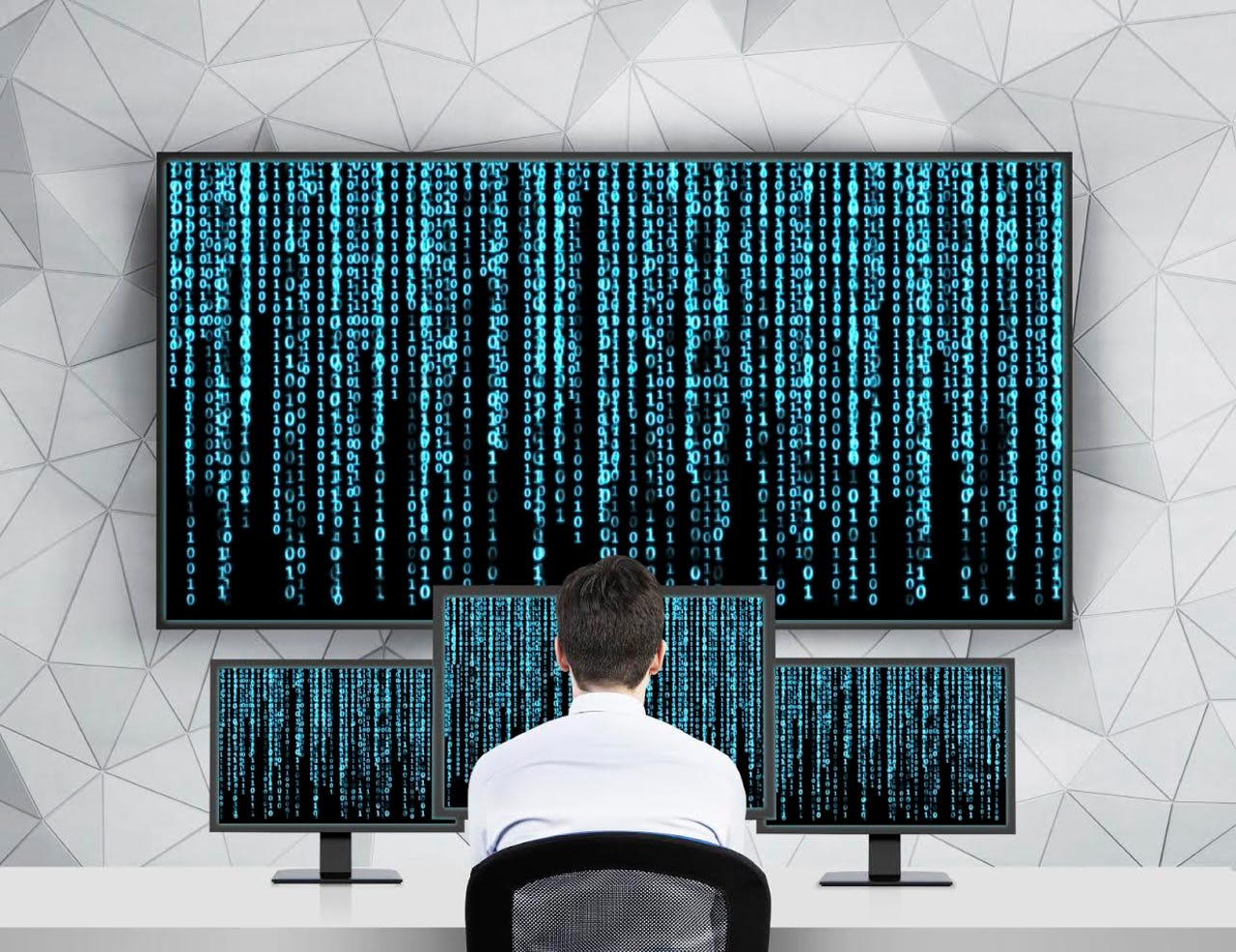 man-in-front-of-computer-viewing-cyber-threats.jpg