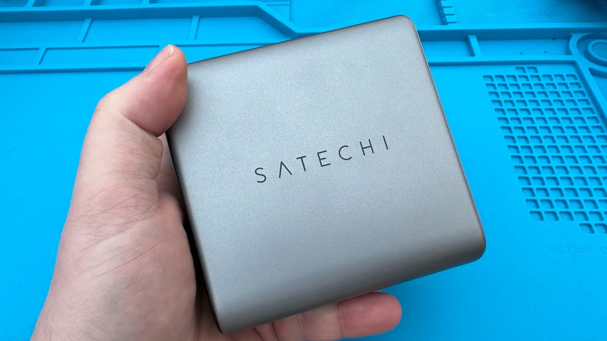 Hand holding Satechi 200W USB-C Six-Port GaN Charger