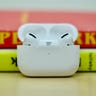 AirPods Pro are seen with books here.