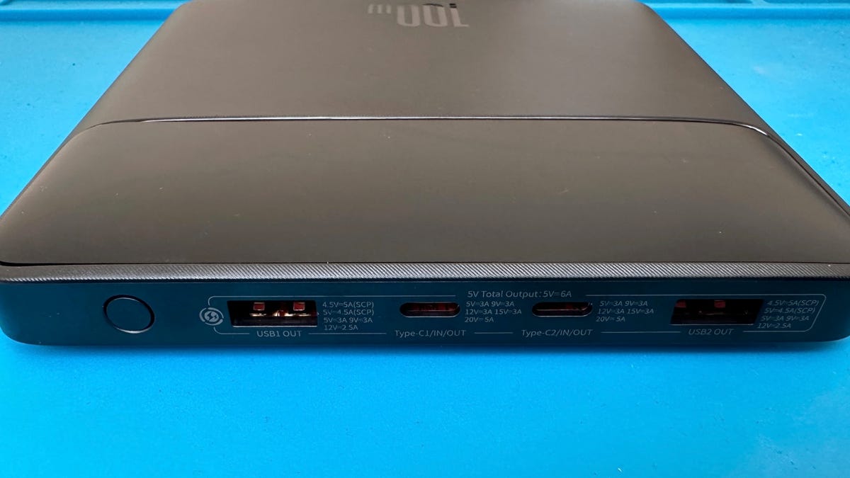 Four ports -- 2 x USB-A and 2 x USB-C -- and a power button