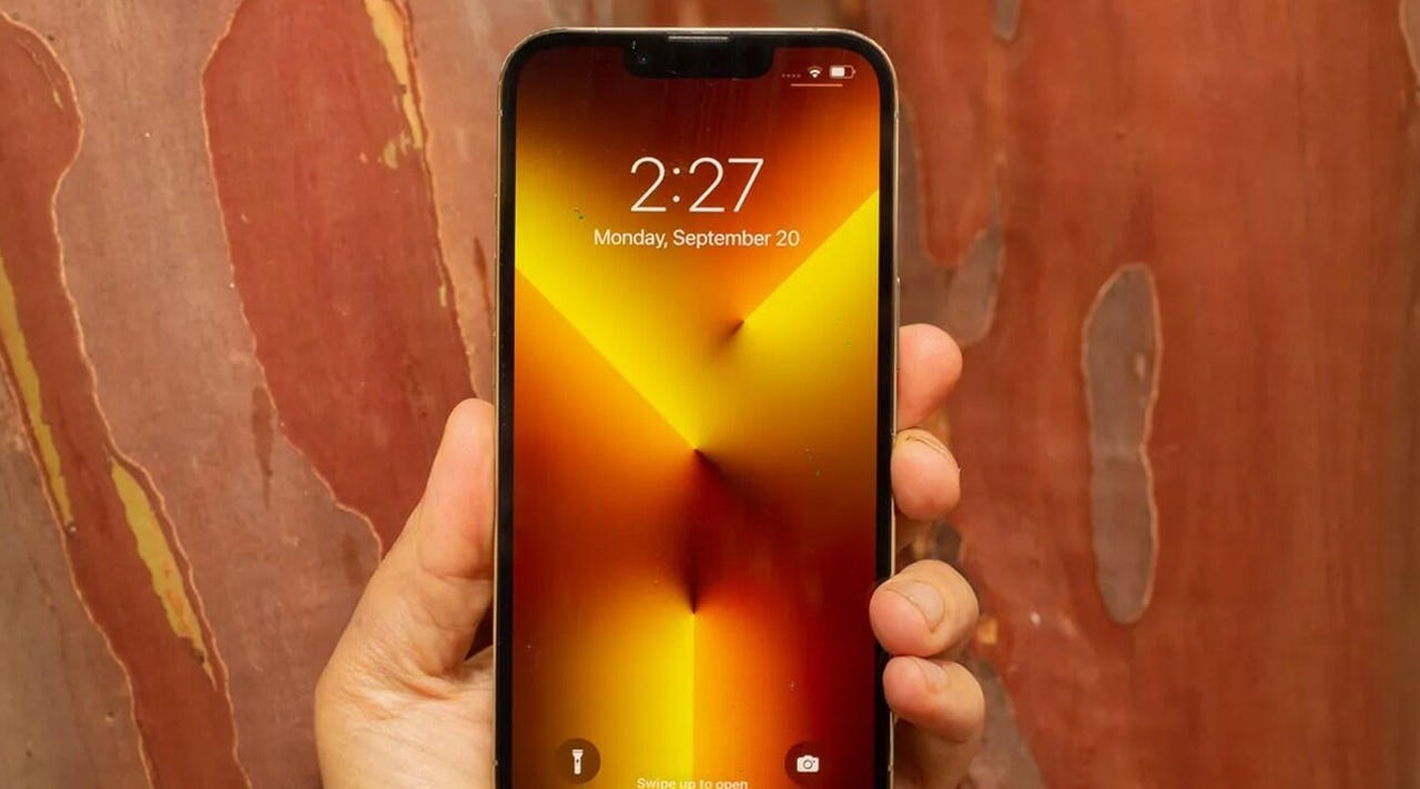 iphone 13 pro being held in a hand