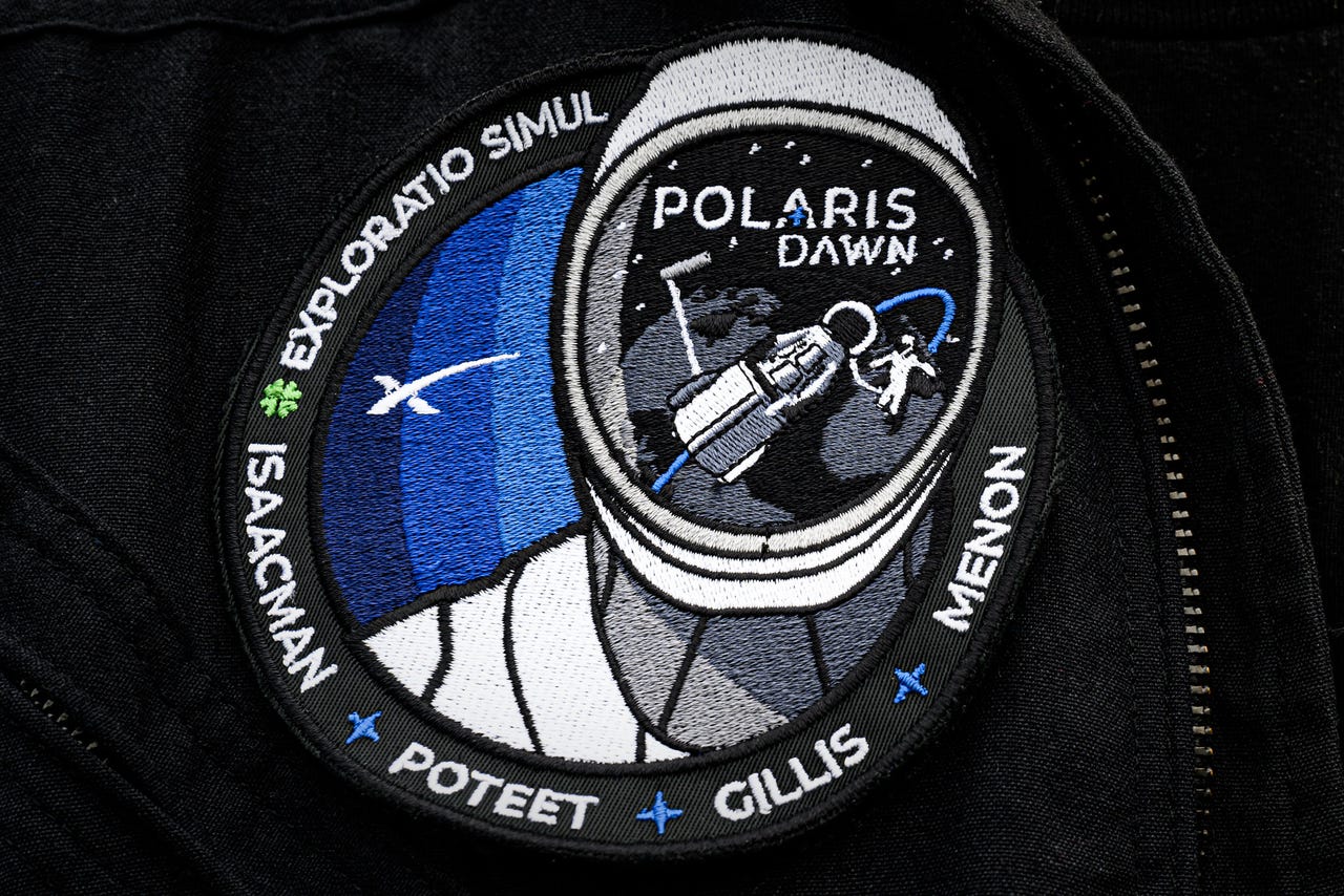 polaris dawn patch on the shoulder of a black jacket