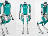 Amazon invests in robots to work alongside humans