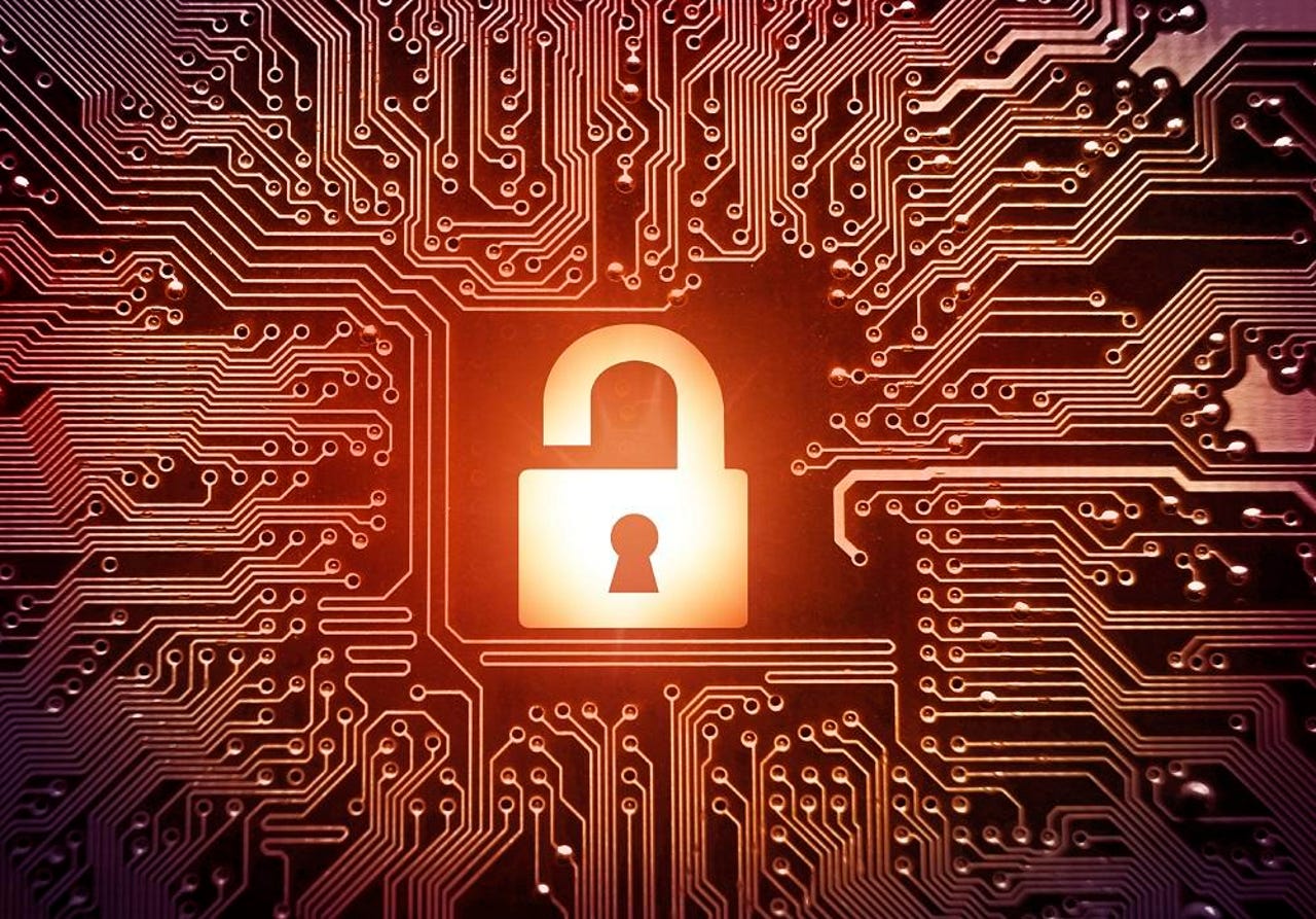 Orange cybersecurity lock on glowing circuit board