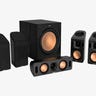 Six black and copper speakers and a subwoofer