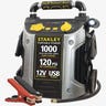A Stanley J5C09 portable jump starter on a grey background