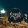 The Logitech G29 racing wheel and Dirt PS4 game on a rally racing background