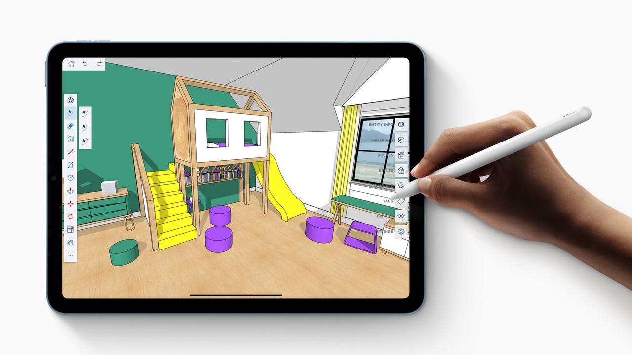 Close-up of someone using a 5th generation iPad Air to design a 3D model of a child's bedroom.