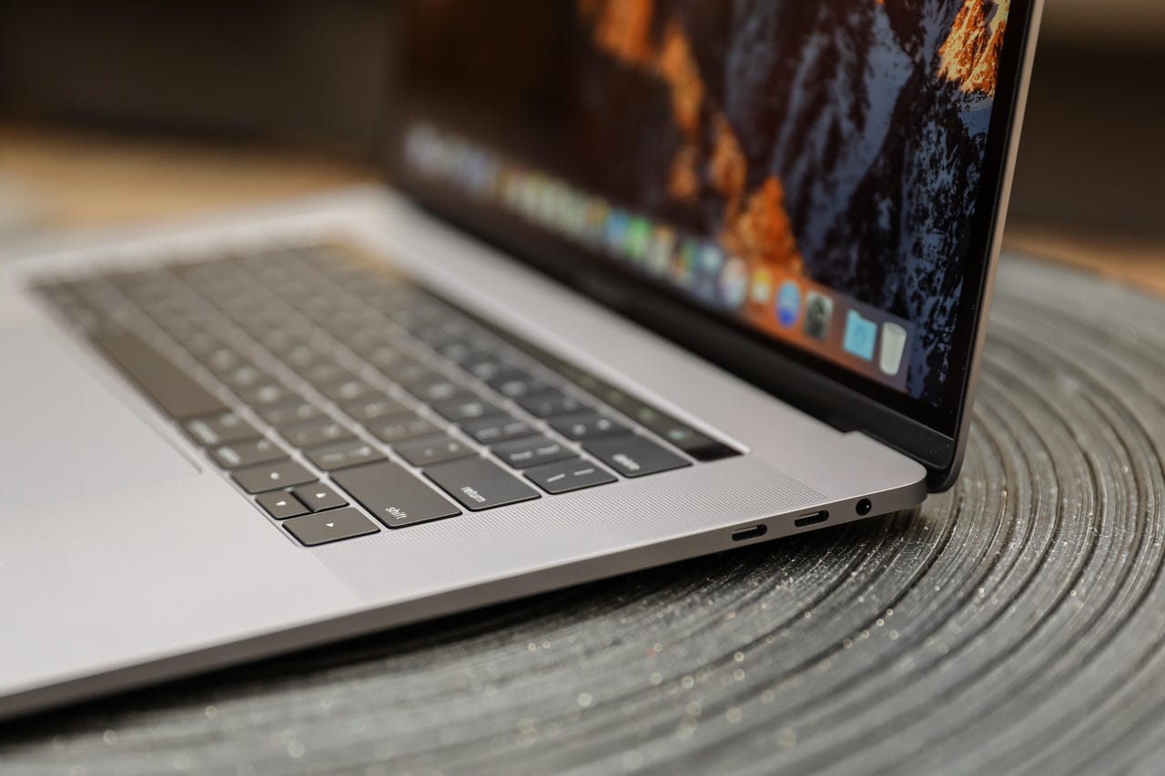 Open MacBook Pro on surface.