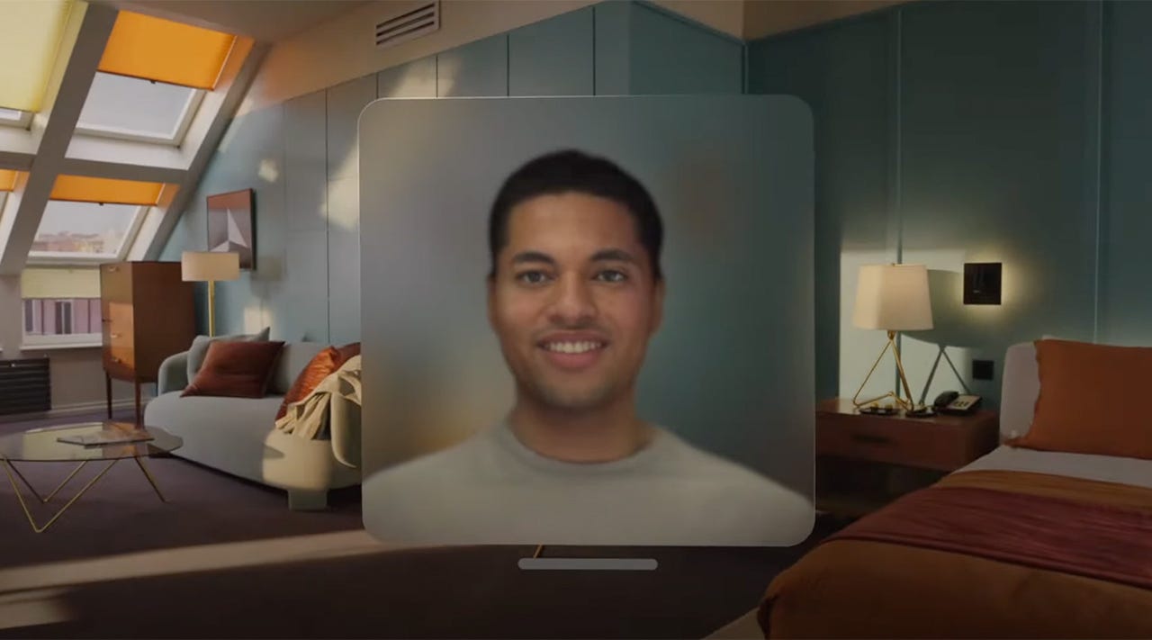 Een digitale Apple Vision Pro-persona geprojecteerd op een afbeelding van een slaapkamer