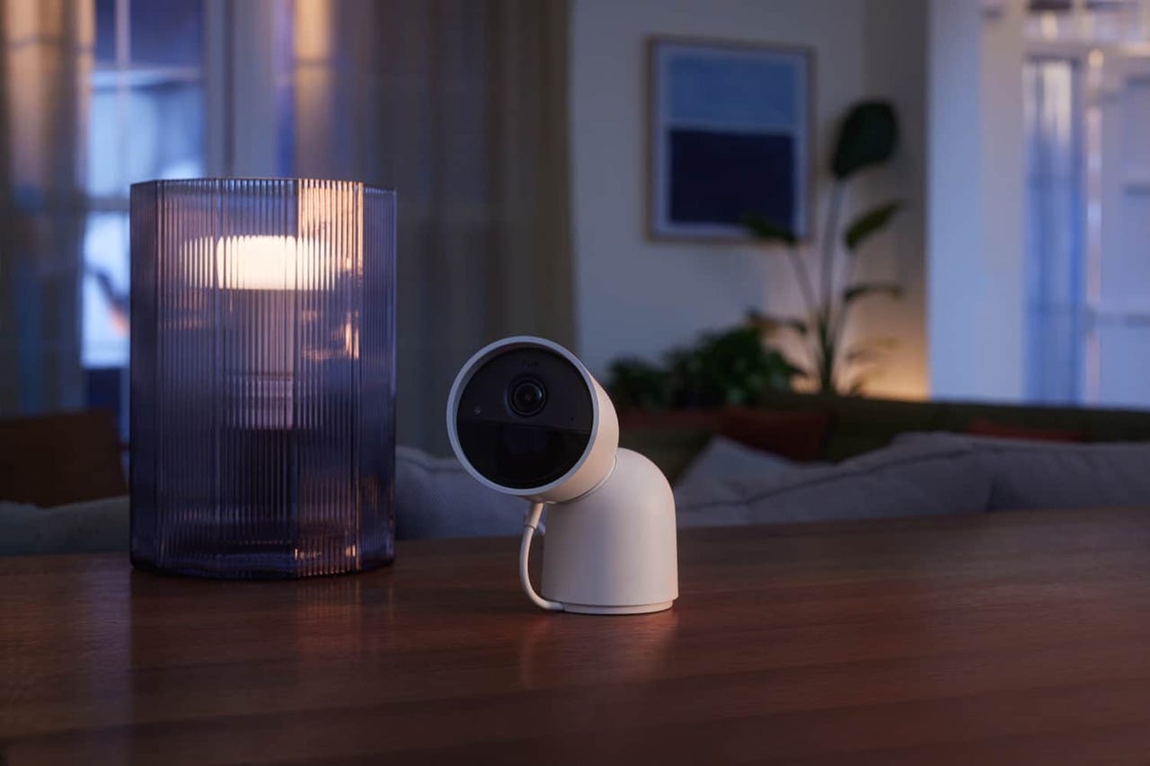 Philips Hue smart home security camera on a desk