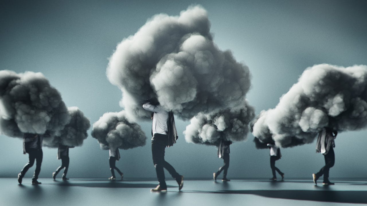 People with heads in clouds