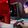 A young woman with purple hair using an Alienware Aurora R14 Ryzen Edition PC to play games.