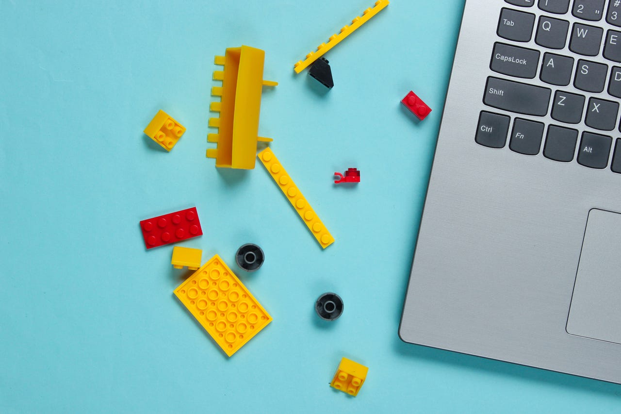 Lego blocks next to laptop