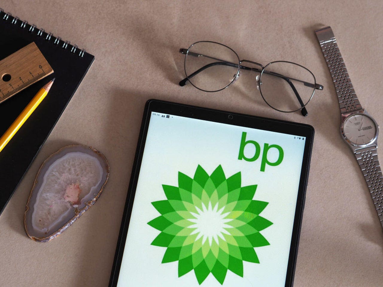 A smartphone with the bp logo on the screen