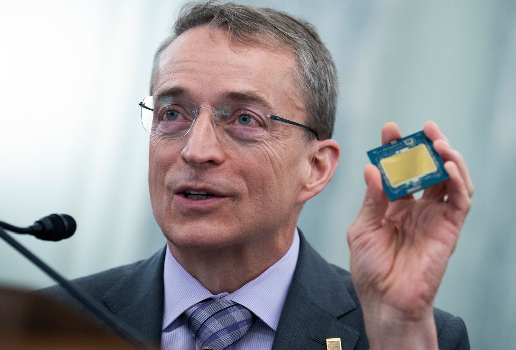 at Gelsinger, CEO, of Intel Corporation, holds a semiconductor chip while testifying during the Senate Commerce, Science, and Transportation hearing