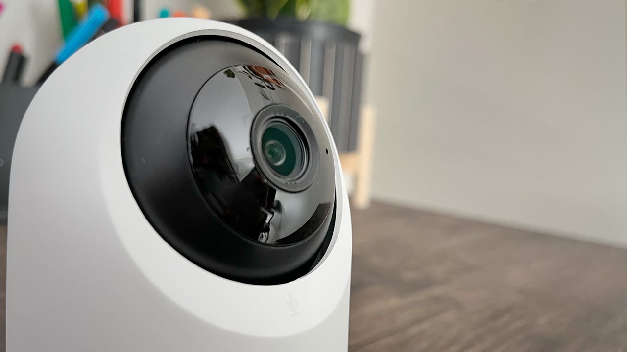 Close-up view of the Pan/Tilt Camera 2K on a table.