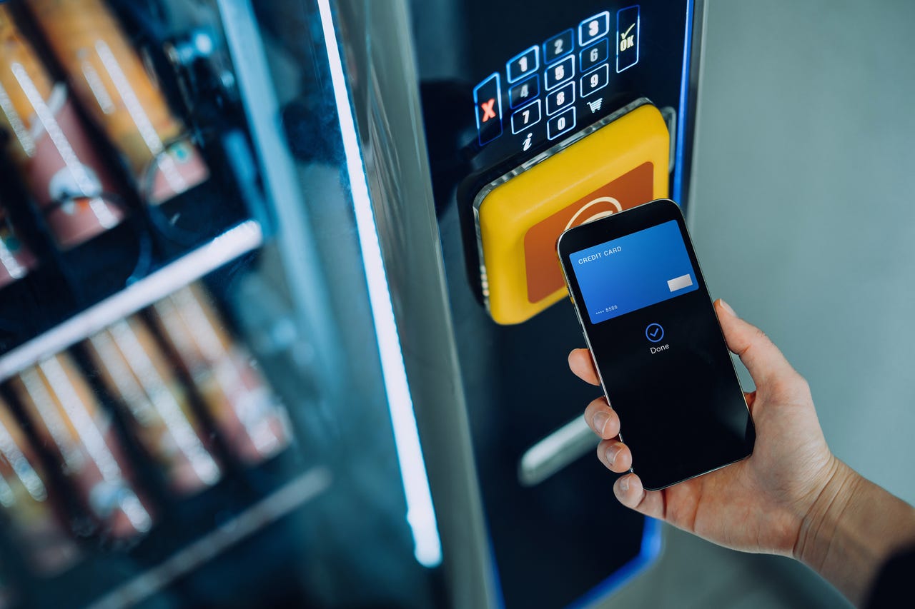 using a digital wallet to buy something from vending machine