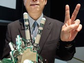 Photos: From brain waves, a robot's victory sign