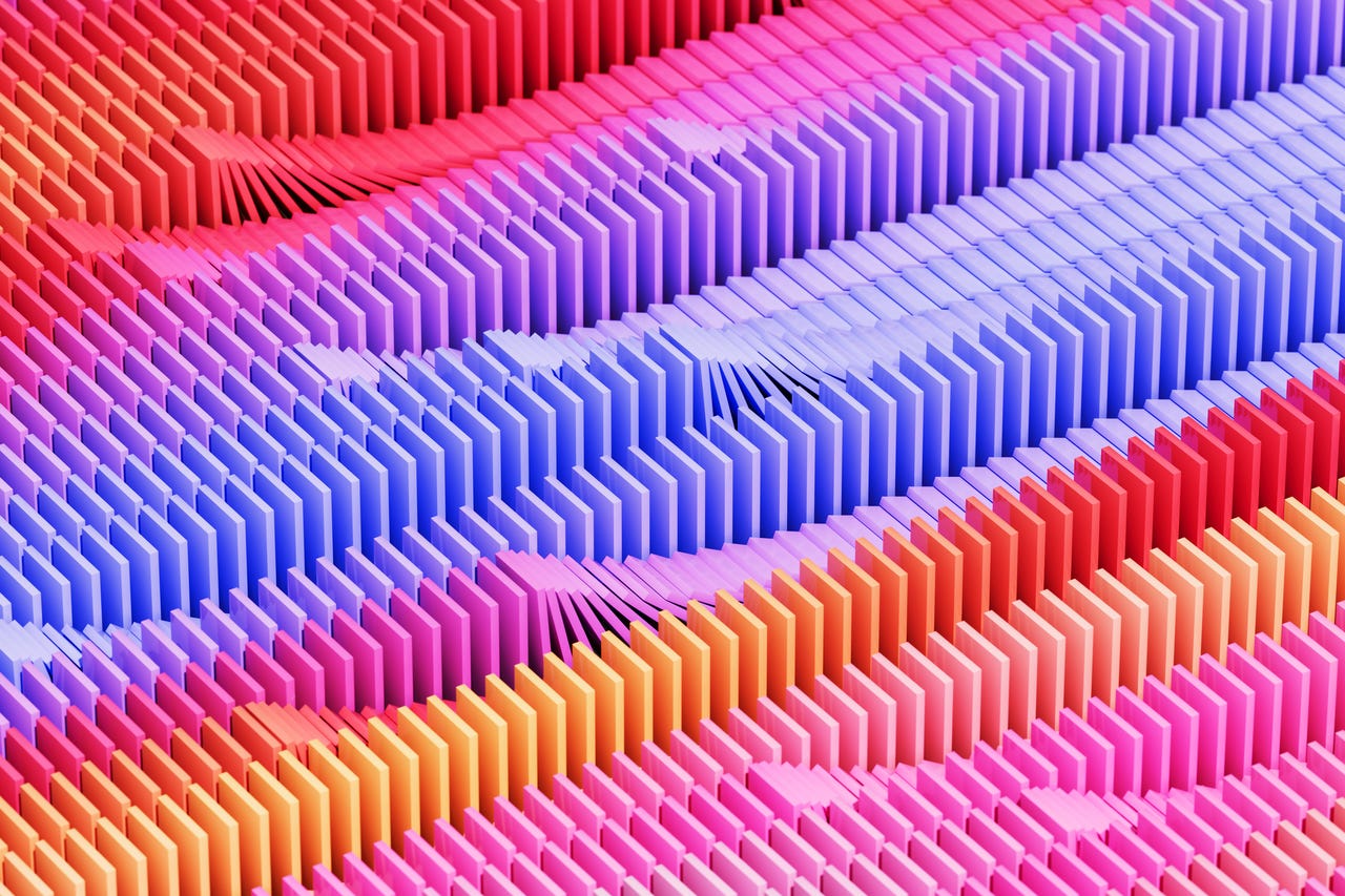 Abstract 3D Image Of Multicolored Blocks Falling Over