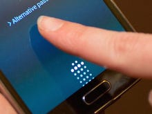 Apple, Samsung race to put fingerprint tech on tablets, despite market growth worries