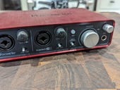Focusrite Scarlet 2i2 is a great audio interface to help improve your podcast efforts