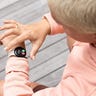 Google Pixel Watch on person's wrist with incoming call