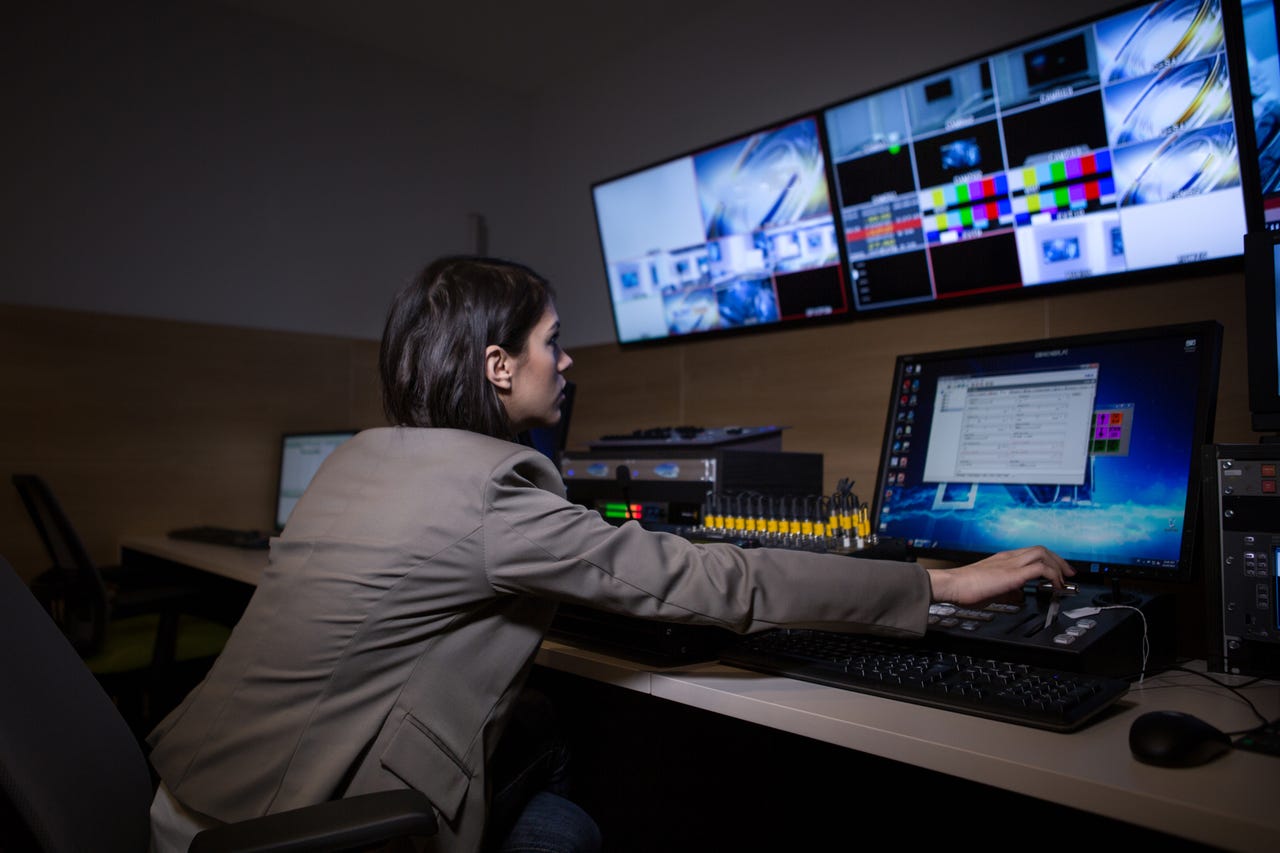 tv-editor-working-with-vision-mixer-in-television-broadcast-gallery.jpg
