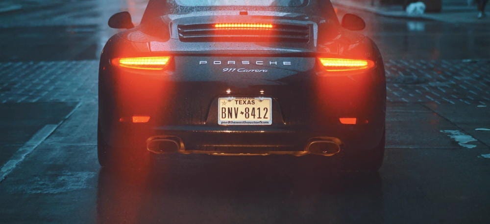 Texas license plate car Porsche