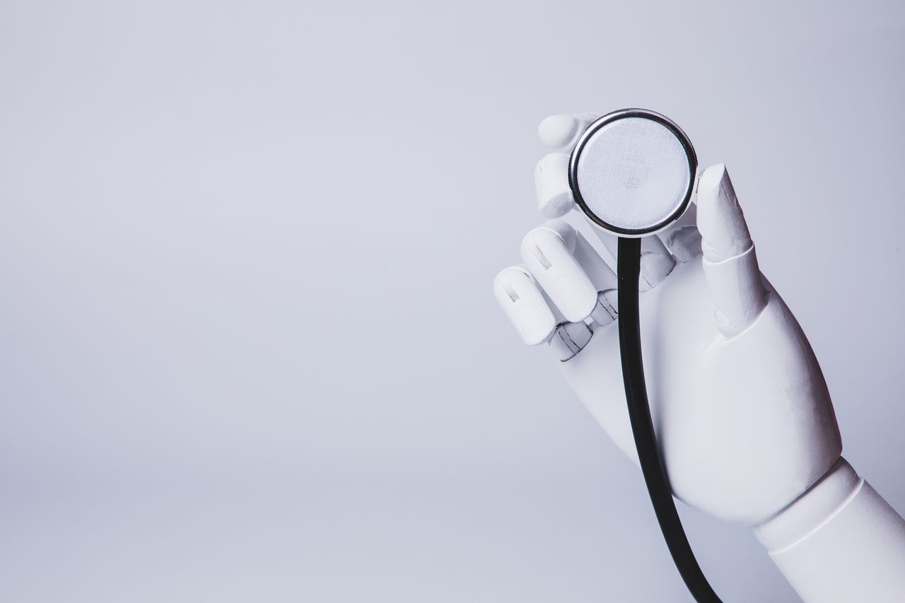 Robot hand holding stethoscope