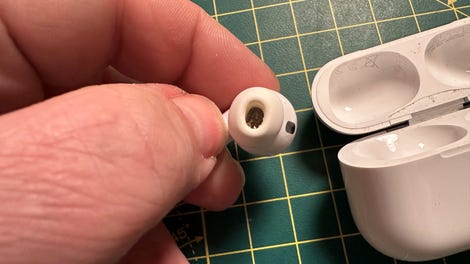 Silicone earbud tips with debris