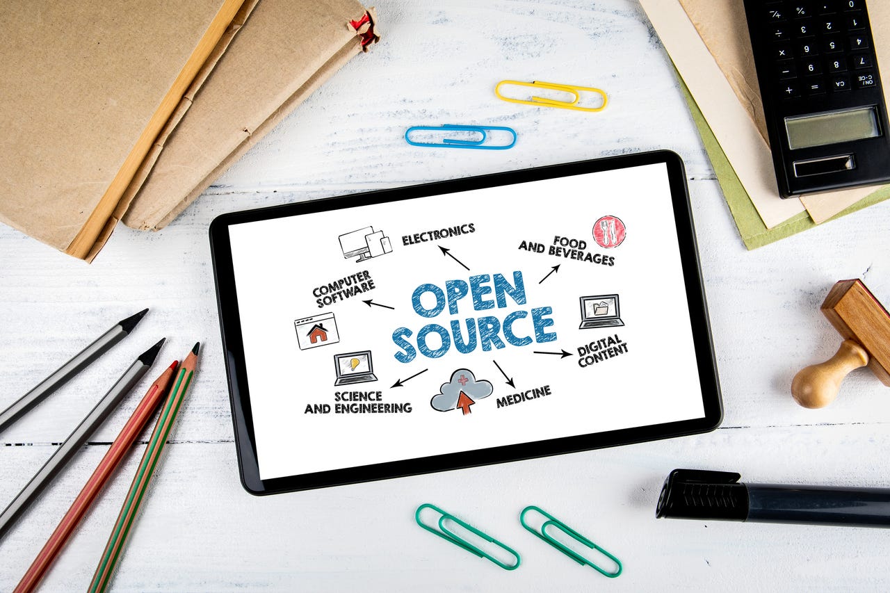 Open Source software concept tablet on desk