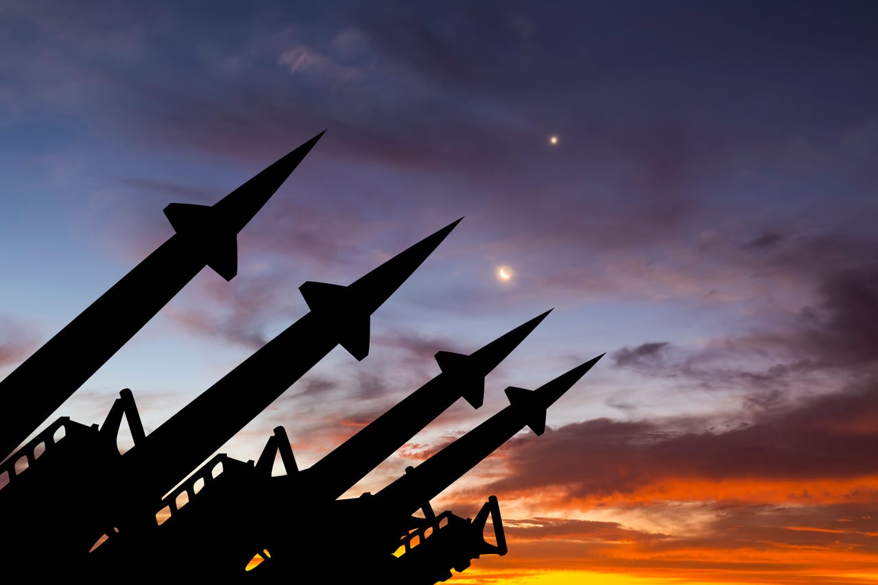 nuclear warheads against a twilight sky
