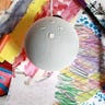 Echo Dot with children's drawings