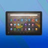 Amazon Fire HD 10 tablet against blue backdrop