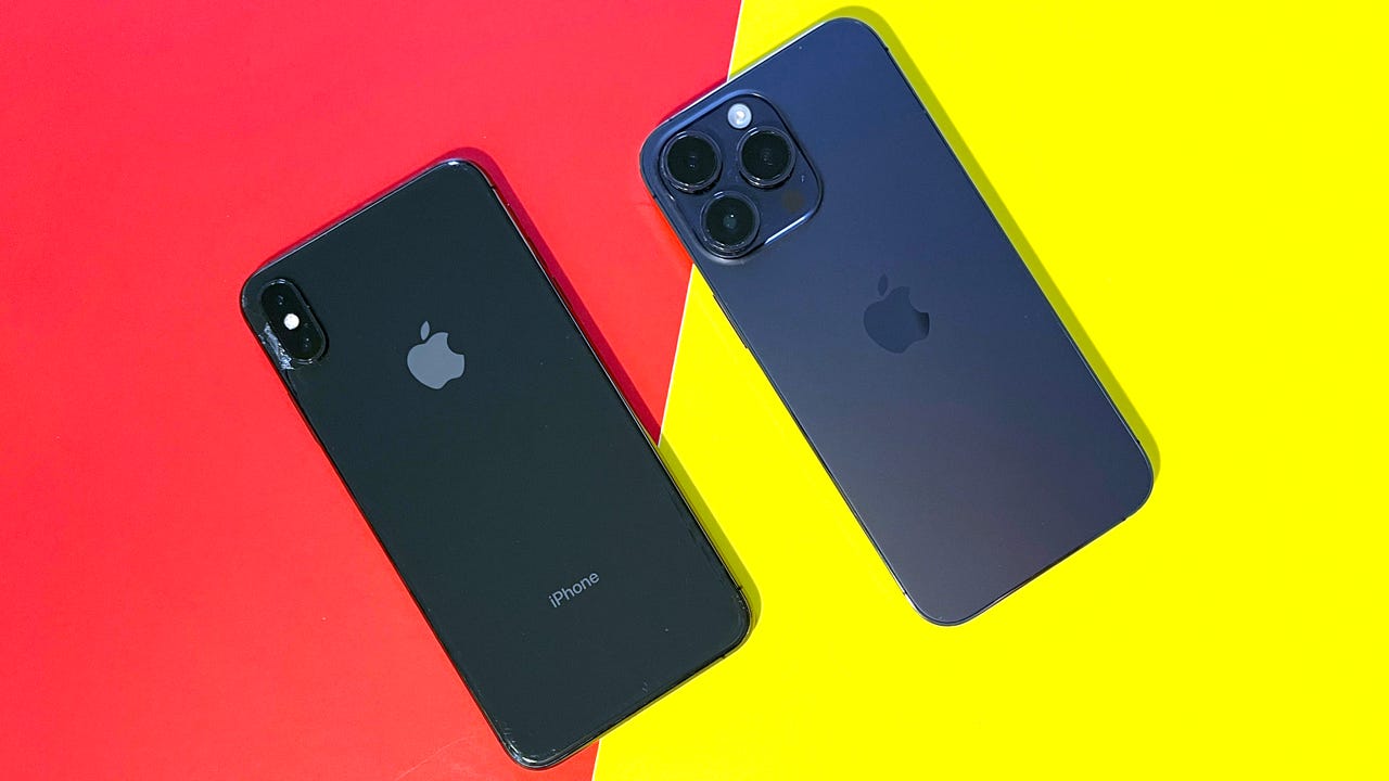 An iPhone XS Max next to an iPhone 14 Pro Max.
