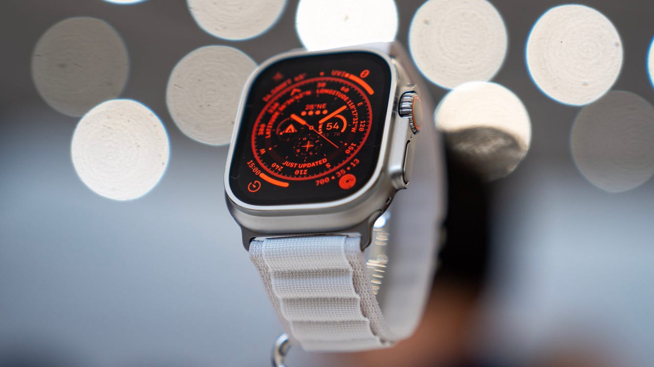 Apple Watch Ultra with a silver watch band.