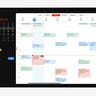 An iPad with a calendar on its screen