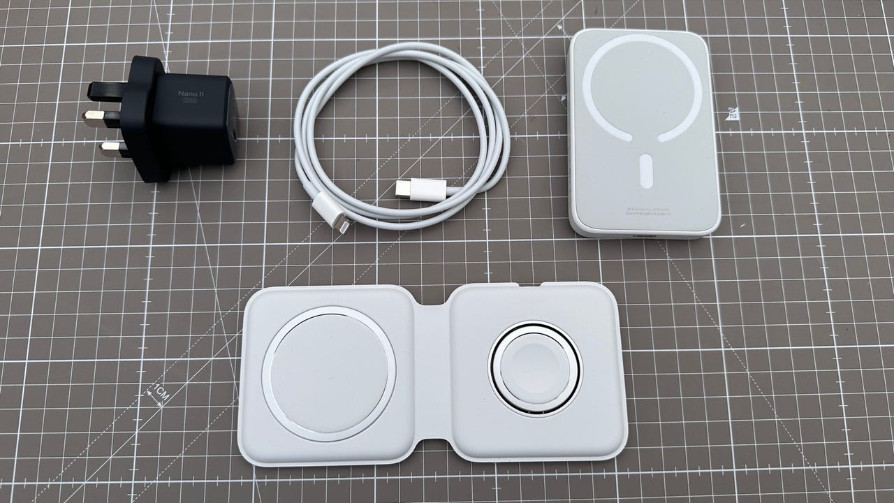 Portable charging kit components spread out on a mat