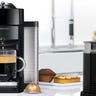 Coffee maker brewing one cup of coffee on kitchen counter