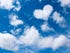 heart white cloud on blue sky background. weather or love abstract symbol