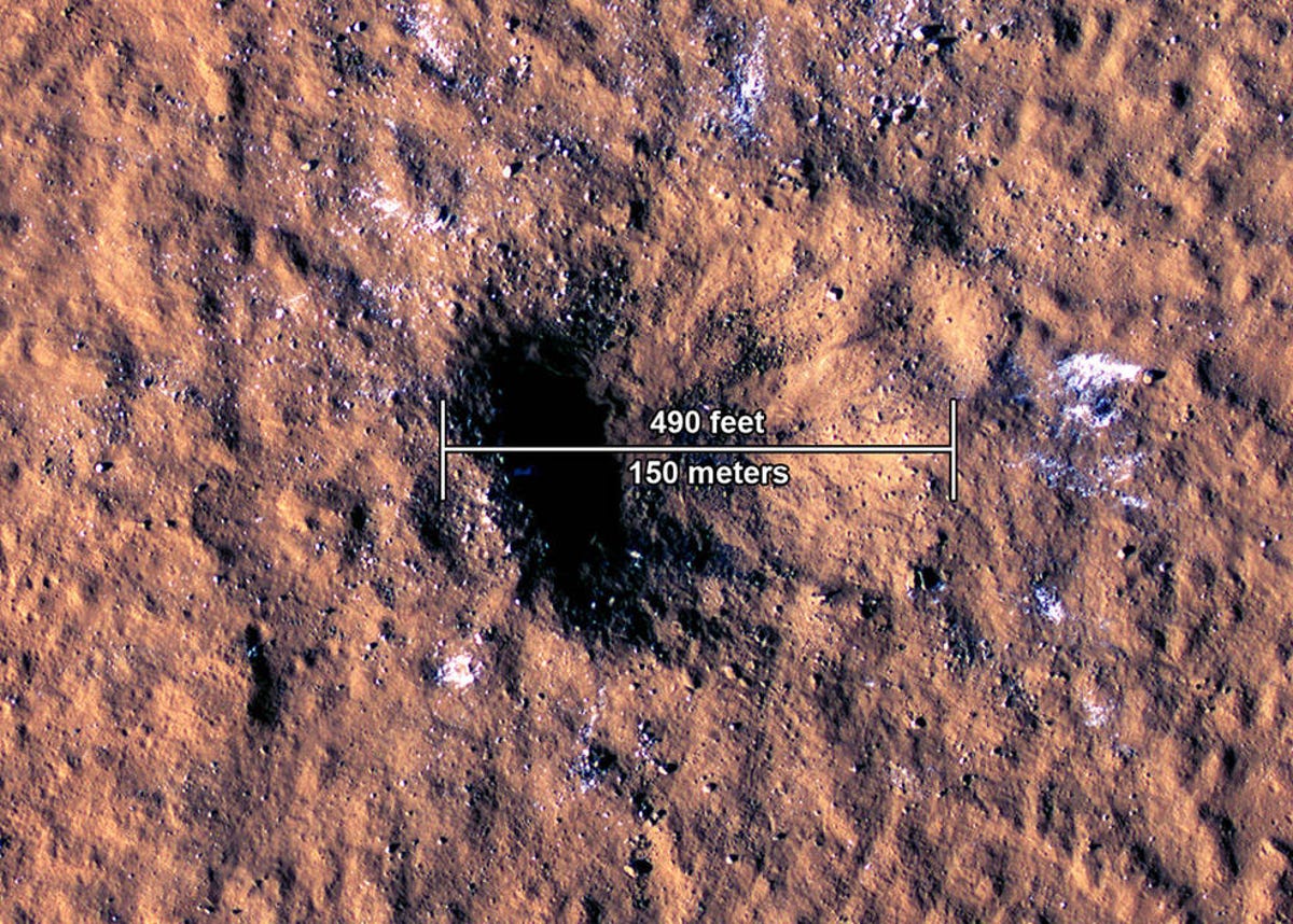 crater on Mars, with a measurement indicating the crater is about 490 feet wide
