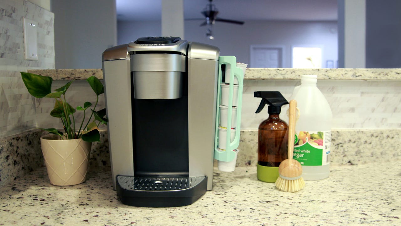 Keurig coffee maker with cleaning supplies