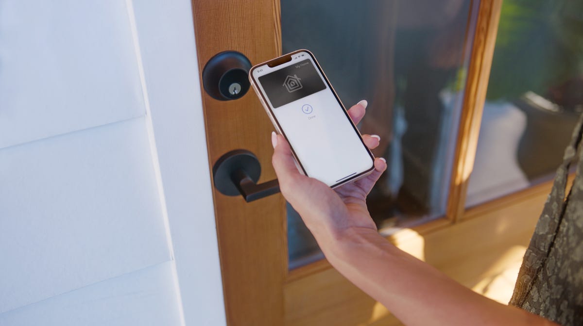 Use the lock app on your phone in front of the closed door