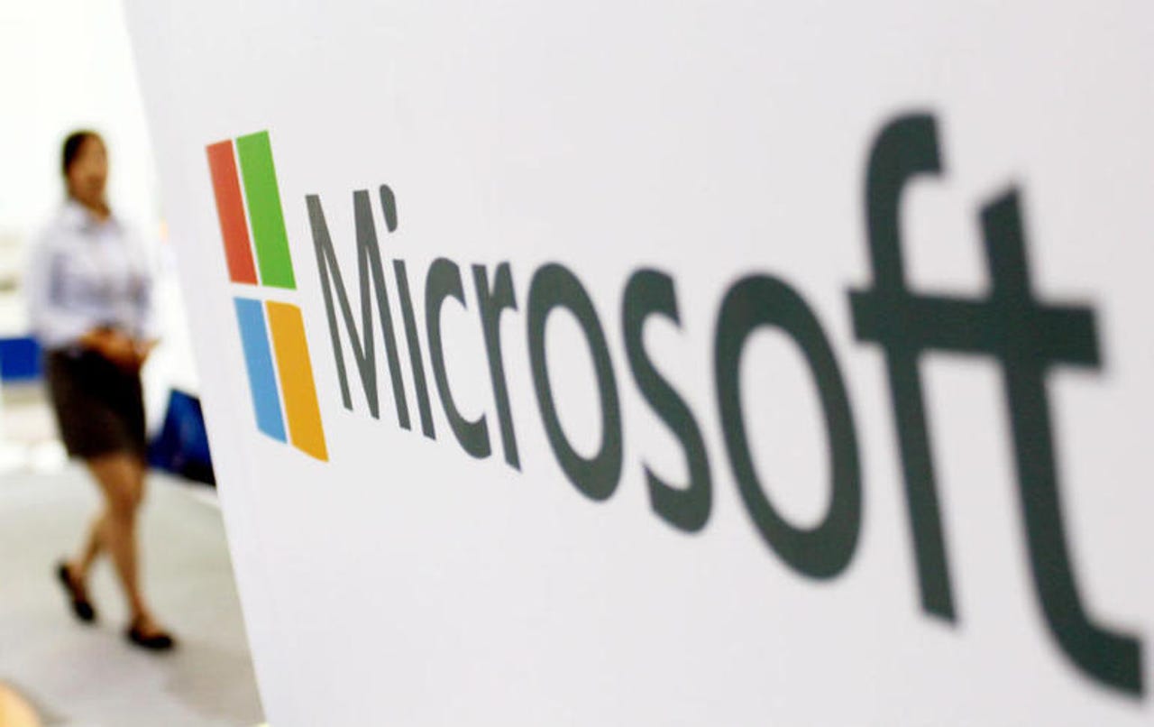 microsoft-logo-with-woman-in-background.jpg